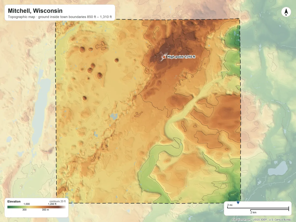 Topographic elevation map of Mitchell, Wisconsin, shaded from 850 ft on the southeast side to 1,310 ft on the northeast side
