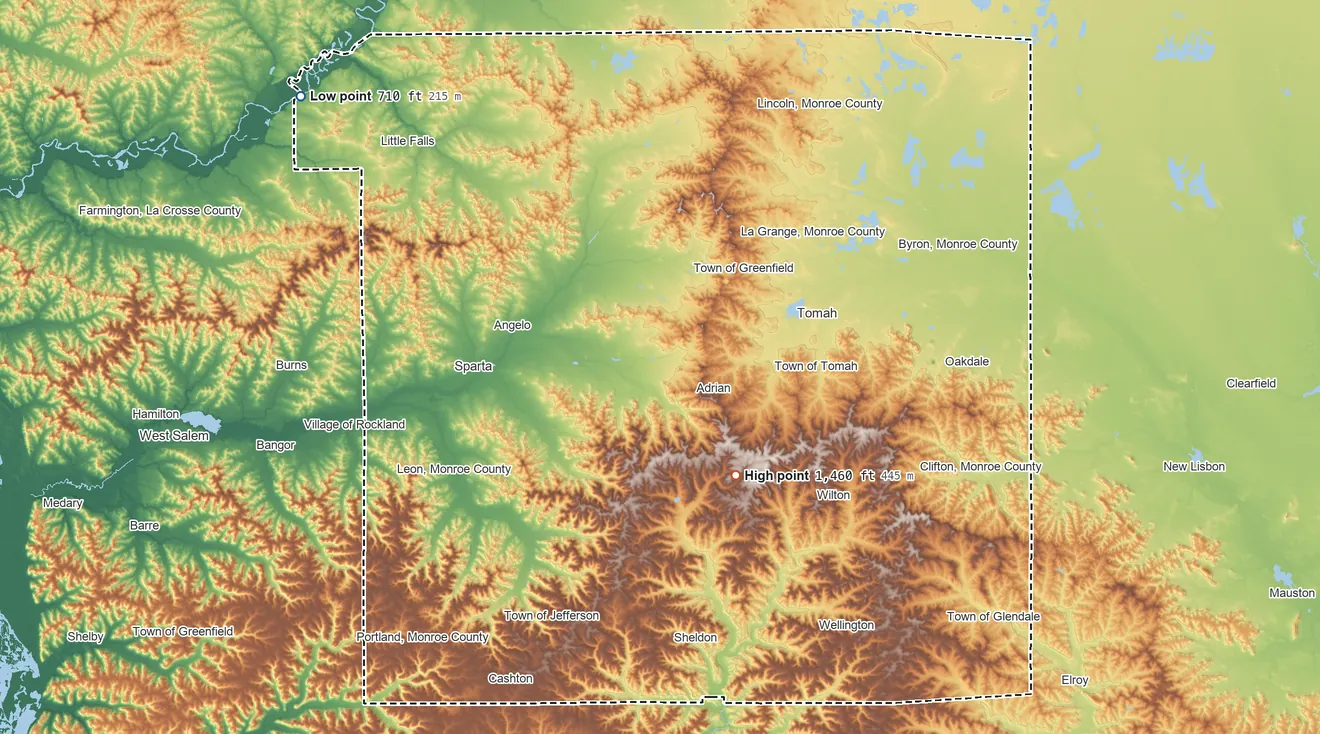 Topographic elevation map of Monroe County, Wisconsin, shaded from 710 ft on the northwest side to 1,460 ft on the southeast side