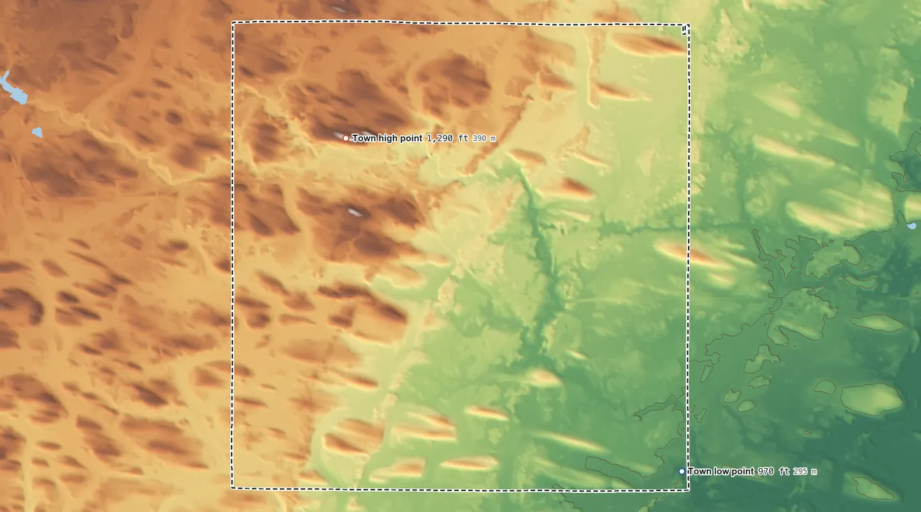 Topographic elevation map of Morris, Wisconsin, shaded from 970 ft on the southeast side to 1,290 ft on the northwest side