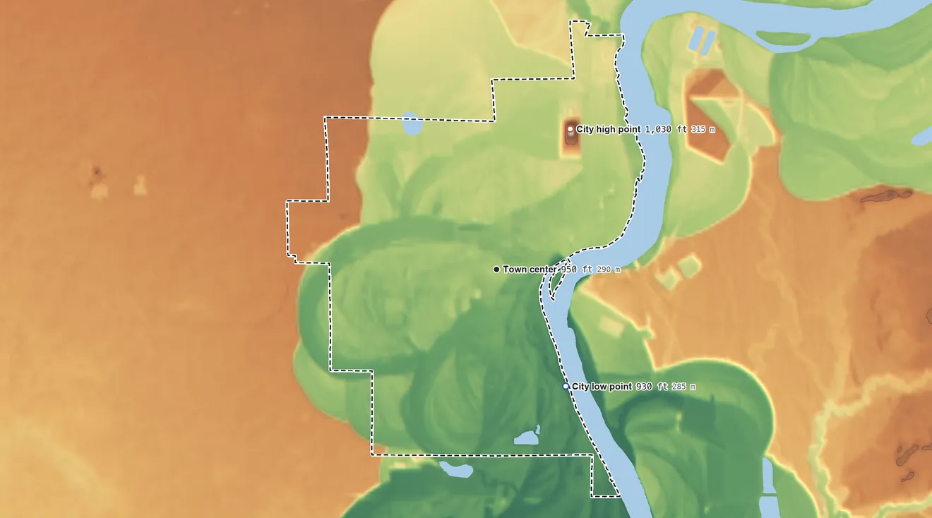 Topographic elevation map of Nekoosa, Wisconsin, shaded from 930 ft on the southeast side to 1,030 ft on the northeast side
