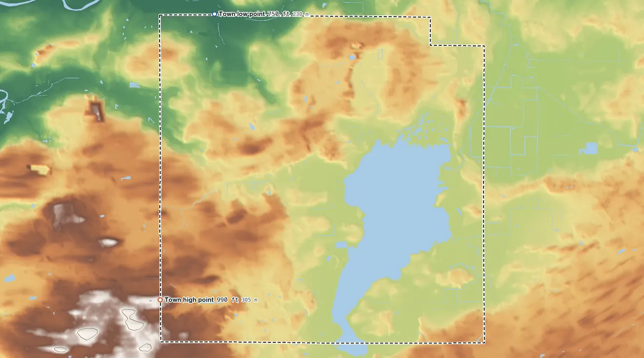 Topographic elevation map of Nepeuskun, Wisconsin, shaded from 750 ft on the northwest side to 990 ft on the southwest side