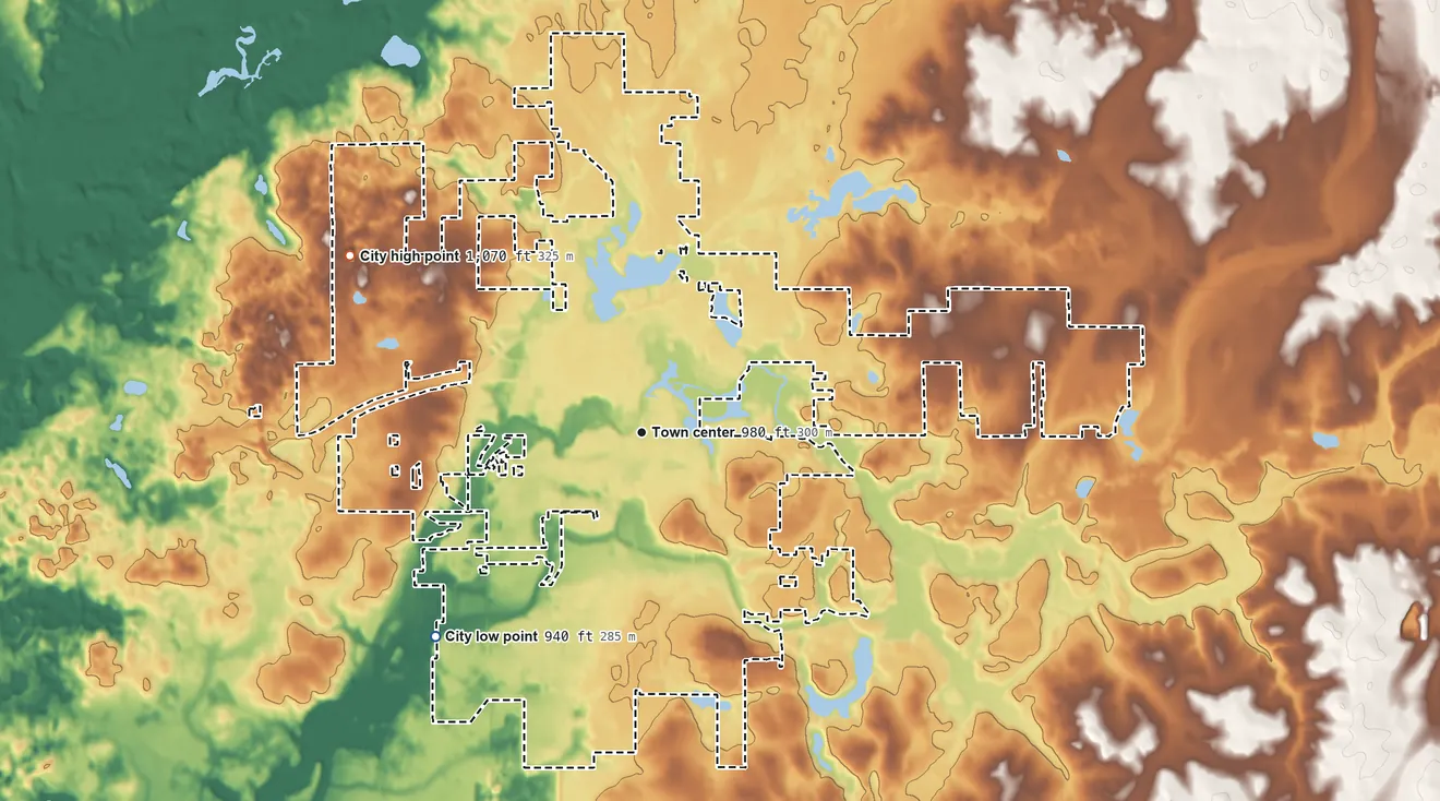 Topographic elevation map of New Richmond, Wisconsin, shaded from 940 ft on the southwest side to 1,070 ft on the northwest side
