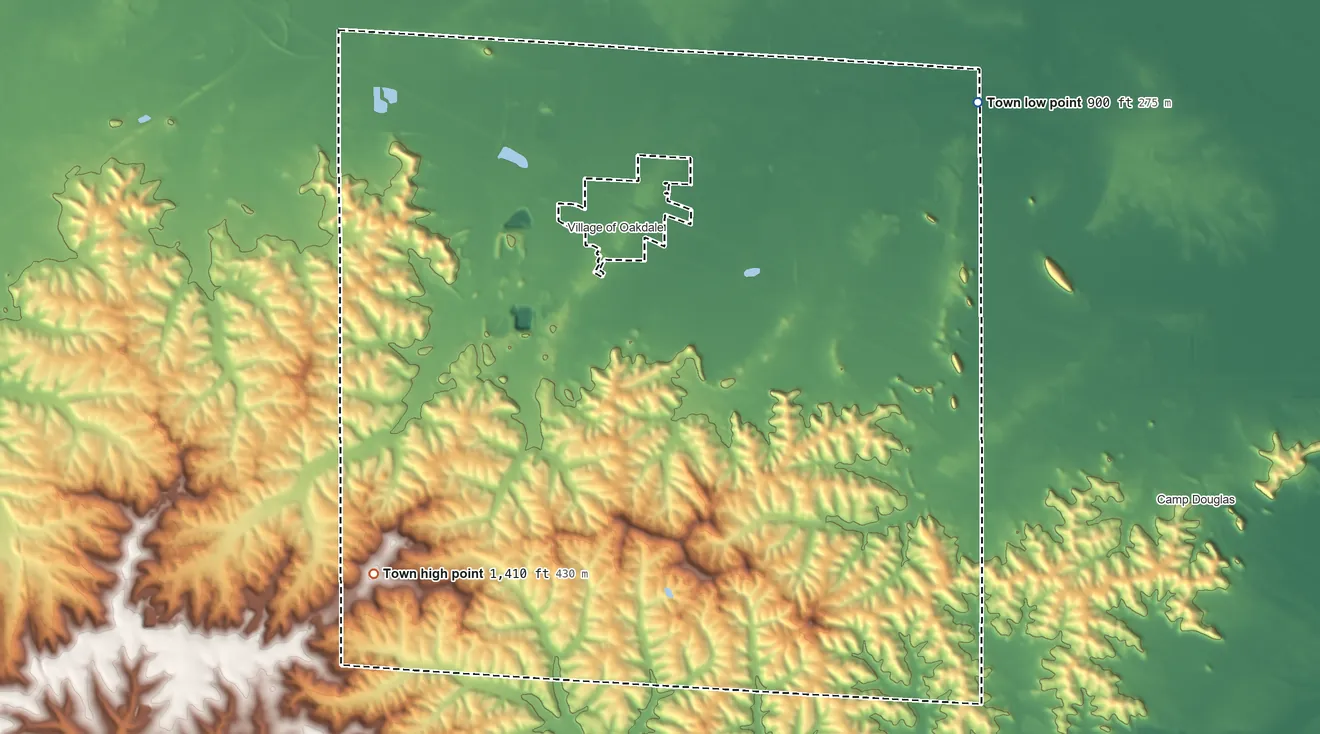 Topographic elevation map of Oakdale, Wisconsin, shaded from 900 ft on the northeast side to 1,410 ft on the southwest side