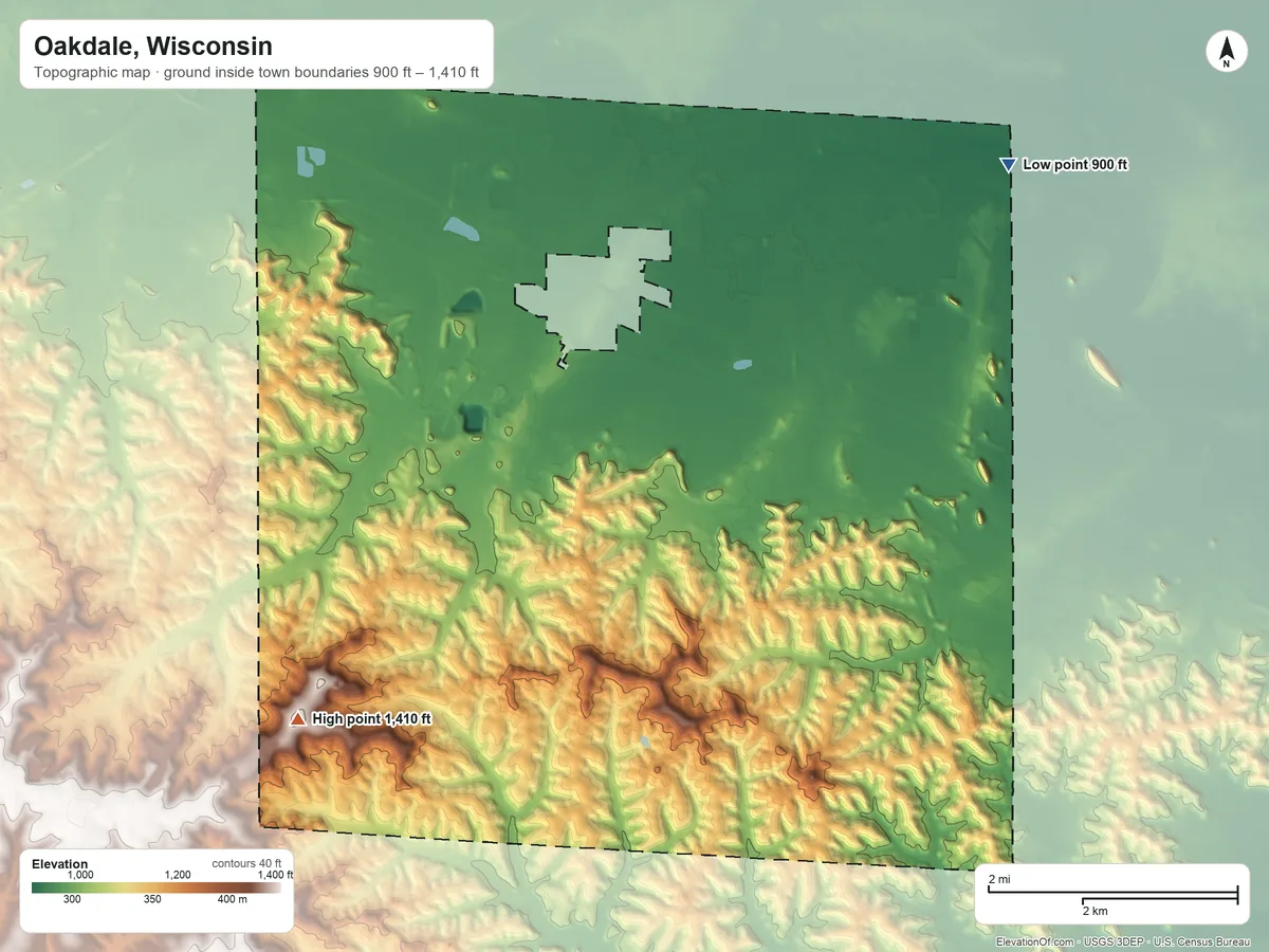 Topographic elevation map of Oakdale, Wisconsin, shaded from 900 ft on the northeast side to 1,410 ft on the southwest side