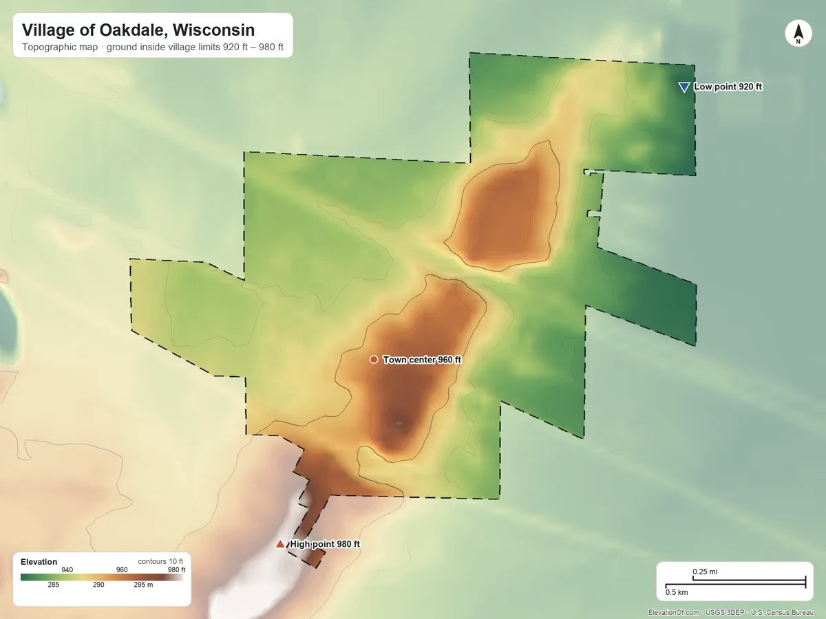 Topographic elevation map of Village of Oakdale, Wisconsin, shaded from 920 ft on the northeast side to 980 ft on the southwest side