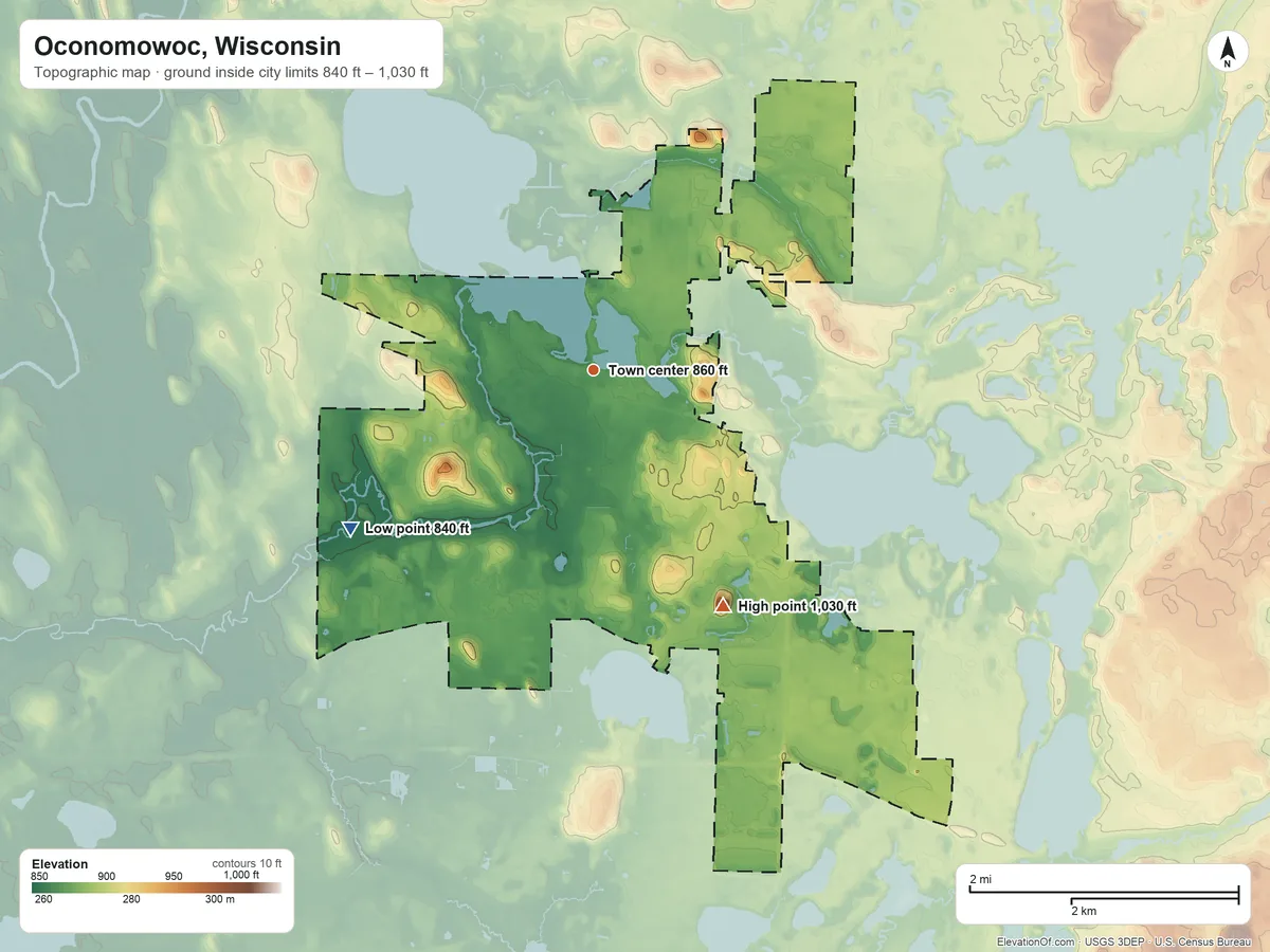 Topographic elevation map of Oconomowoc, Wisconsin, shaded from 840 ft on the southwest side to 1,030 ft on the southeast side