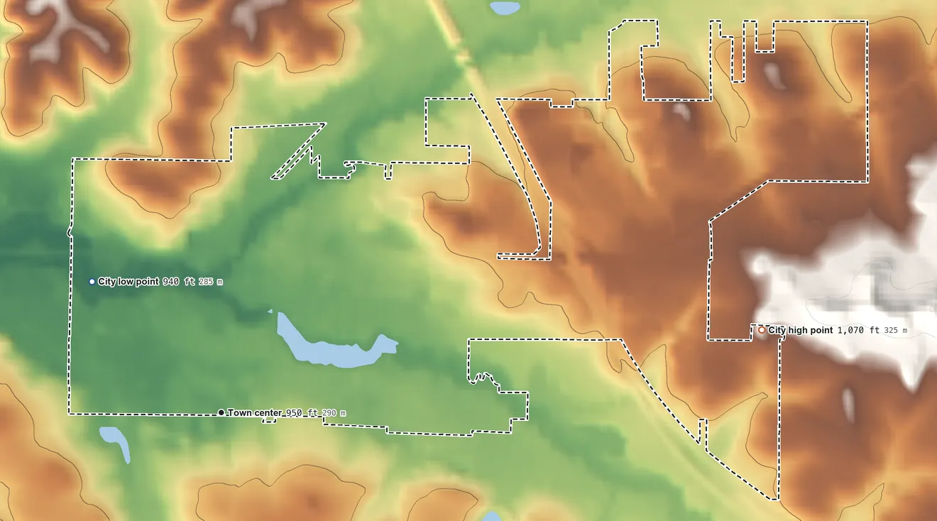 Topographic elevation map of Osseo, Wisconsin, shaded from 940 ft on the northwest side to 1,070 ft on the east side