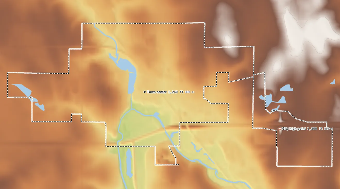Topographic elevation map of Owen, Wisconsin, shaded from 1,200 ft on the southwest side to 1,300 ft on the east side