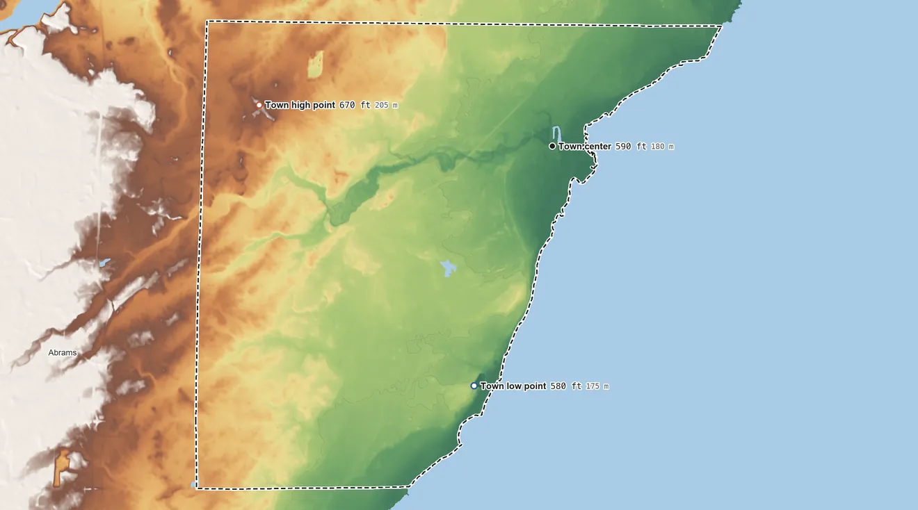 Topographic elevation map of Pensaukee, Wisconsin, shaded from 580 ft on the south side to 670 ft on the west side