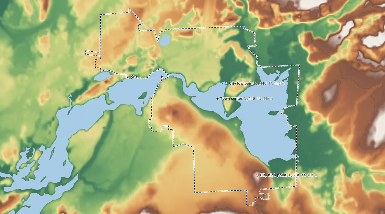 Topographic elevation map of Phillips, Wisconsin, shaded from 1,440 ft near the middle to 1,510 ft on the southeast side