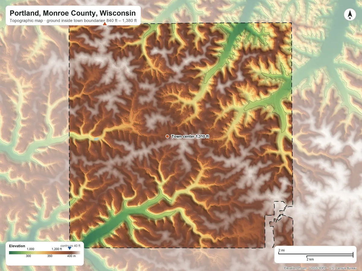 Topographic elevation map of Portland, Monroe County, Wisconsin, shaded from 840 ft on the southwest side to 1,380 ft on the northwest side