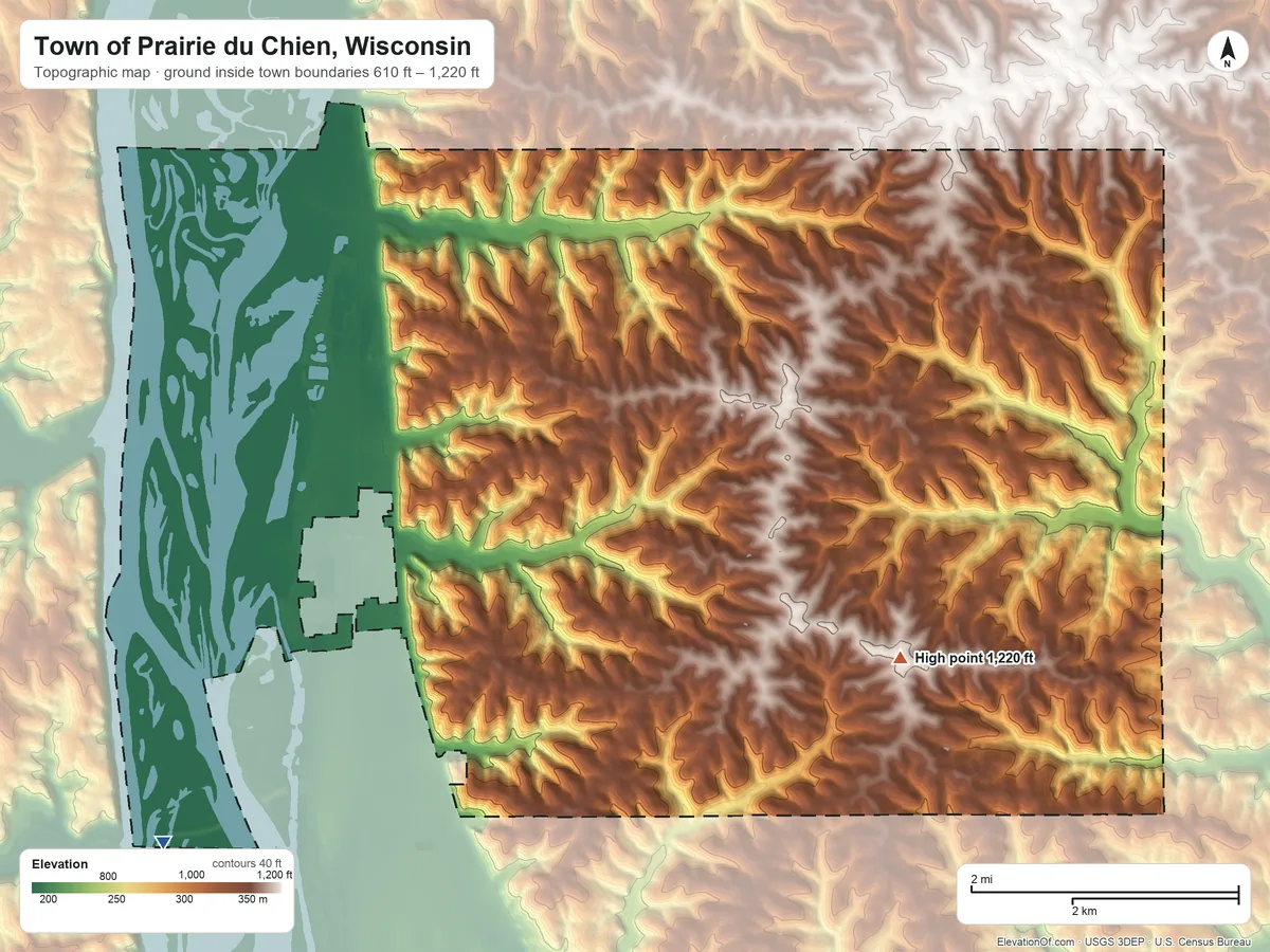 Topographic elevation map of Town of Prairie du Chien, Wisconsin, shaded from 610 ft on the southwest side to 1,220 ft on the east side