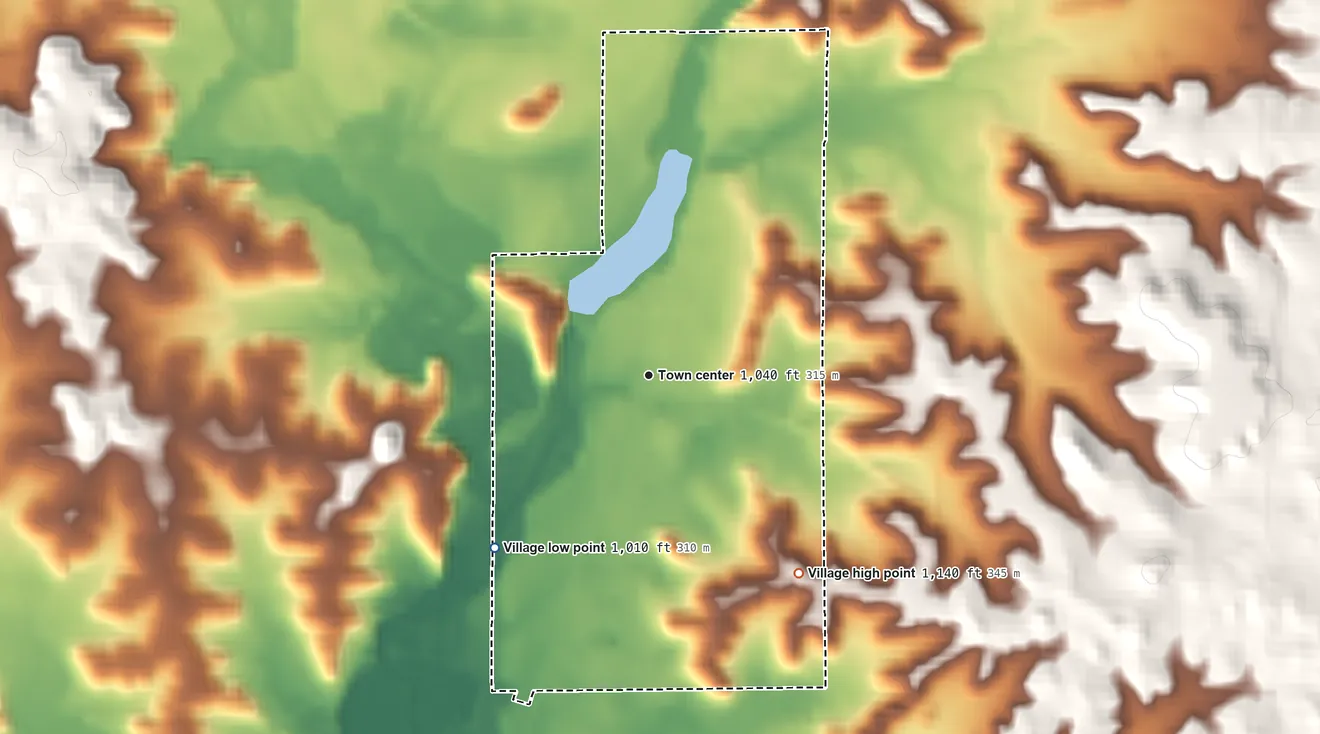 Topographic elevation map of Village of Prairie Farm, Wisconsin, shaded from 1,010 ft on the southwest side to 1,140 ft on the southeast side
