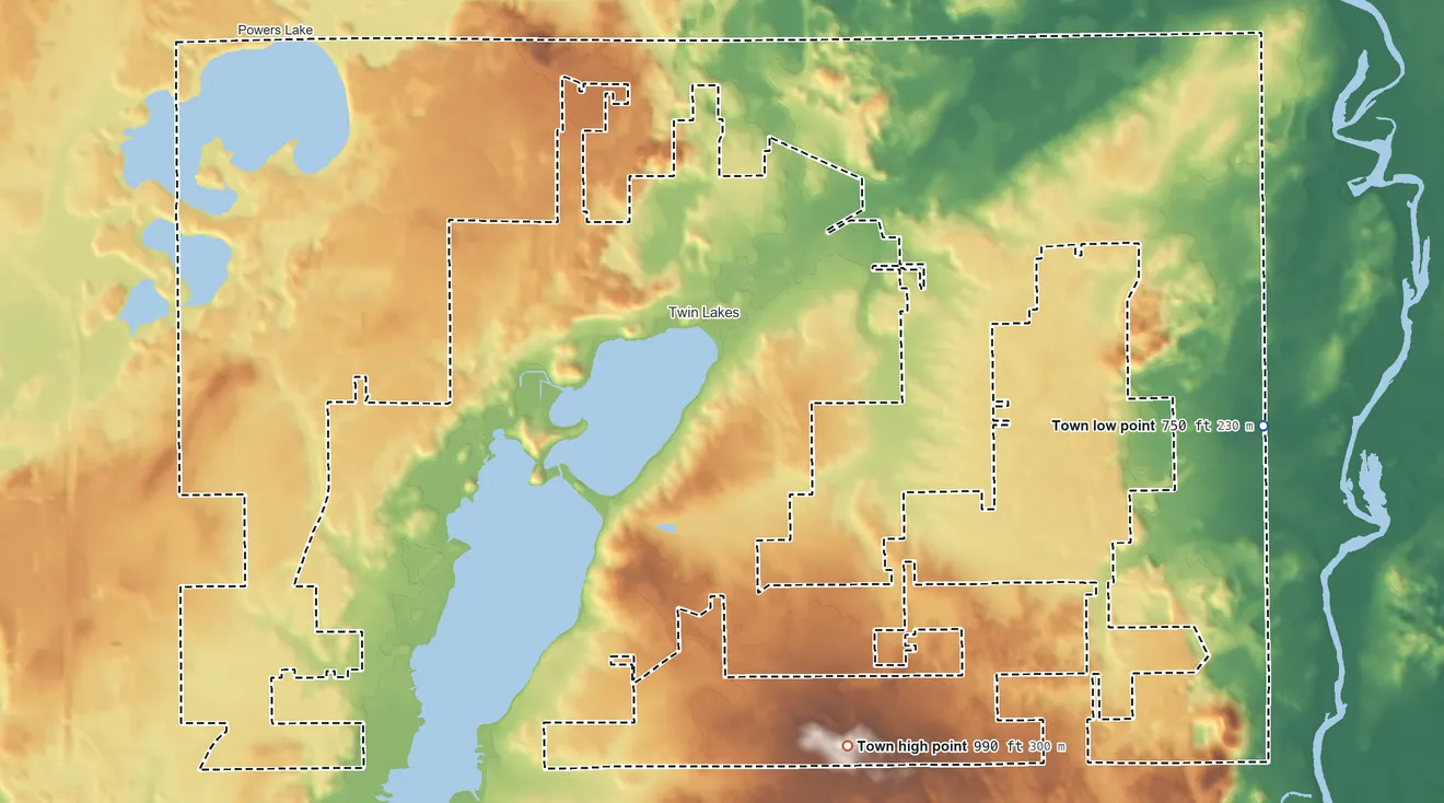 Topographic elevation map of Randall, Wisconsin, shaded from 750 ft on the east side to 990 ft on the southeast side