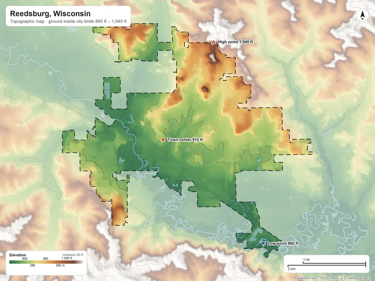 Topographic elevation map of Reedsburg, Wisconsin, shaded from 860 ft on the southeast side to 1,040 ft on the northeast side
