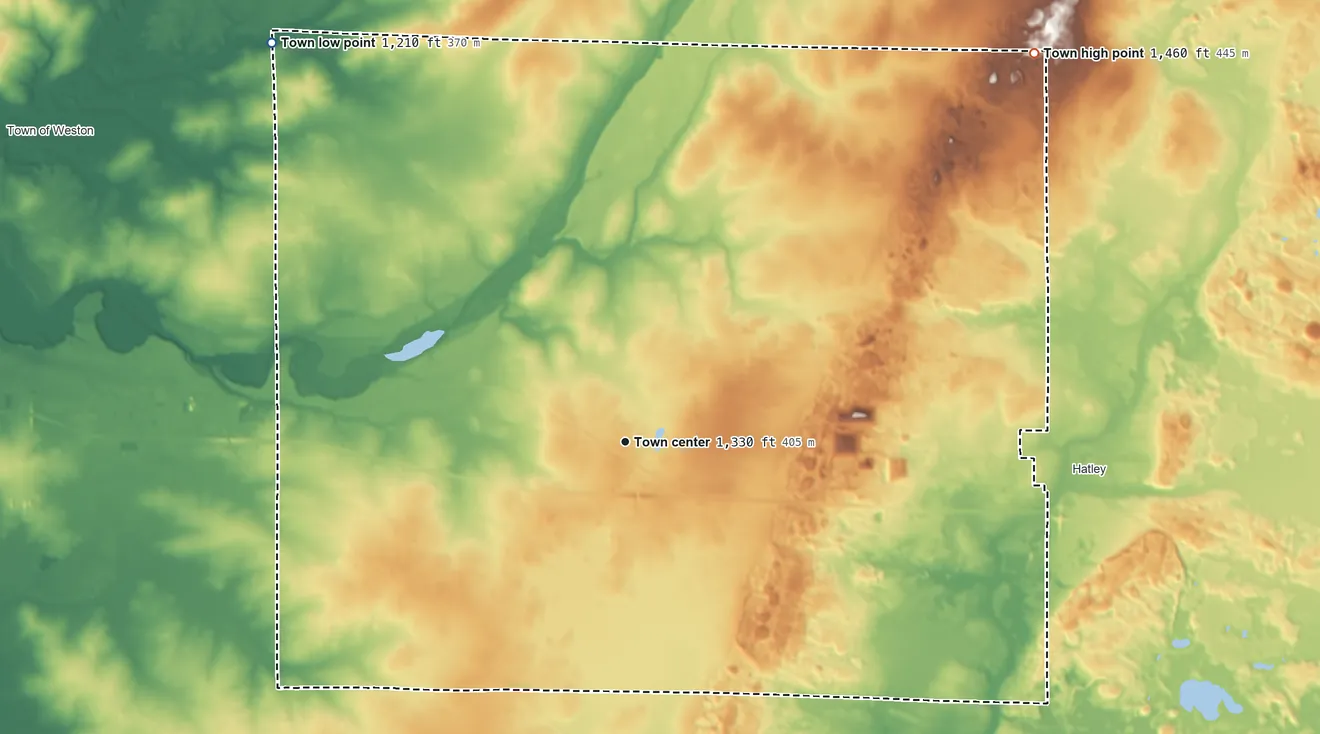 Topographic elevation map of Ringle, Wisconsin, shaded from 1,210 ft on the northwest side to 1,460 ft on the northeast side