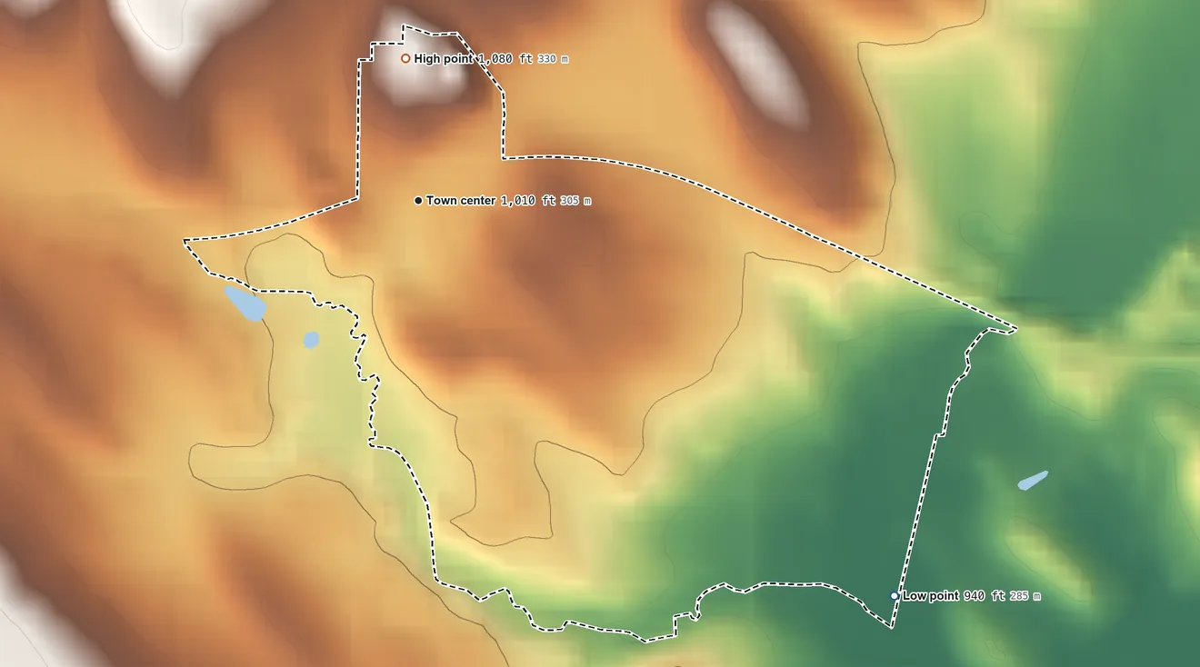 Topographic elevation map of Rubicon, Dodge County, Wisconsin, shaded from 940 ft on the southeast side to 1,080 ft on the north side