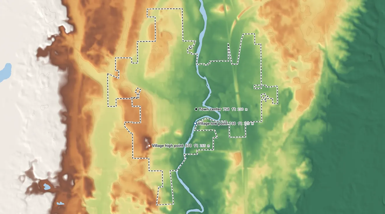 Topographic elevation map of Saukville, Wisconsin, shaded from 740 ft near the middle to 870 ft on the southwest side
