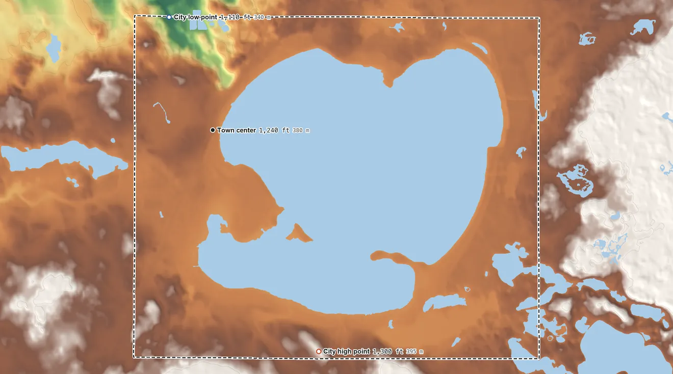 Topographic elevation map of Shell Lake, Wisconsin, shaded from 1,110 ft on the north side to 1,300 ft on the southeast side