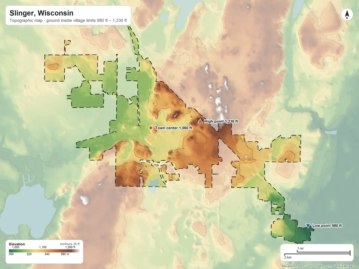 Topographic elevation map of Slinger, Wisconsin, shaded from 980 ft on the southeast side to 1,230 ft on the east side