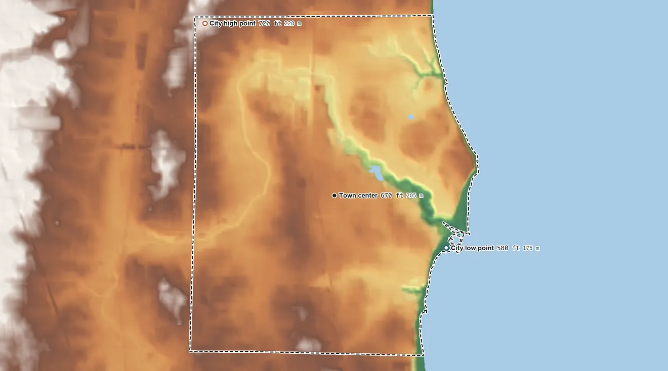 Topographic elevation map of South Milwaukee, Wisconsin, shaded from 580 ft on the southeast side to 720 ft on the northwest side