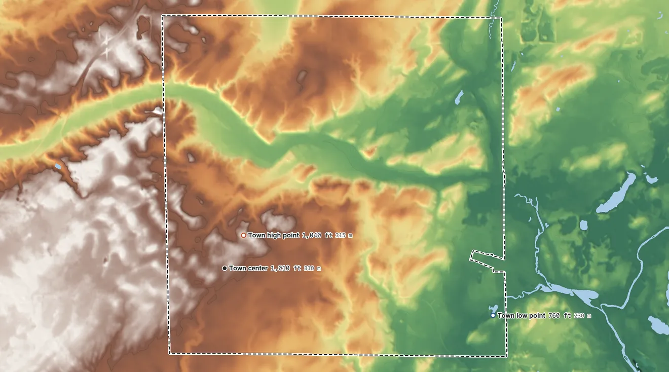 Topographic elevation map of Spring Prairie, Wisconsin, shaded from 760 ft on the east side to 1,040 ft near the middle