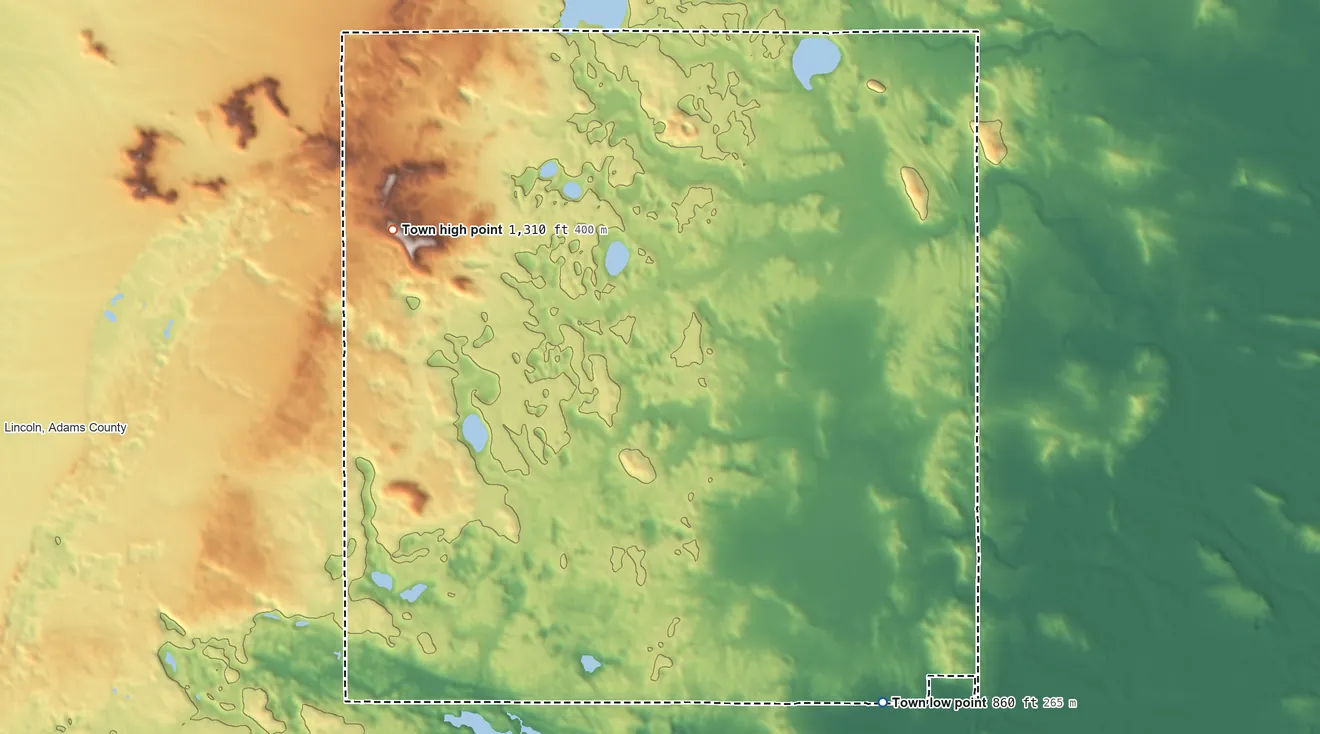 Topographic elevation map of Springfield, Marquette County, Wisconsin, shaded from 860 ft on the southeast side to 1,310 ft on the west side
