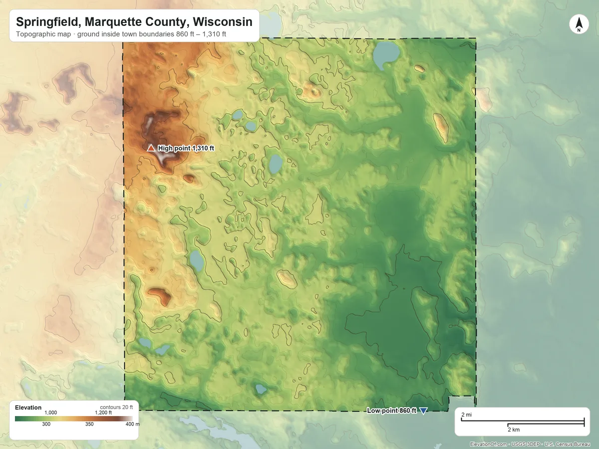 Topographic elevation map of Springfield, Marquette County, Wisconsin, shaded from 860 ft on the southeast side to 1,310 ft on the west side