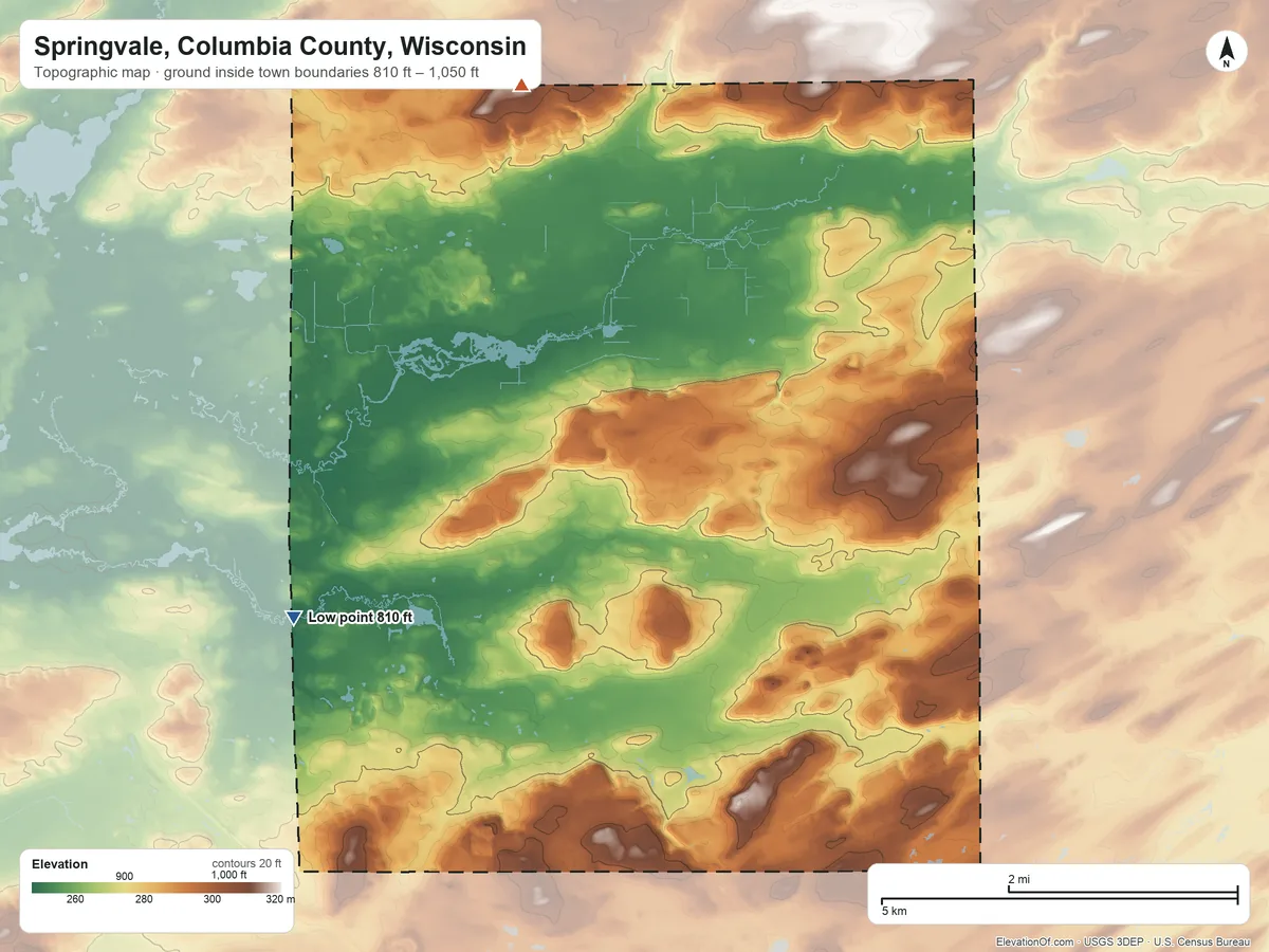 Topographic elevation map of Springvale, Columbia County, Wisconsin, shaded from 810 ft on the southwest side to 1,050 ft on the north side