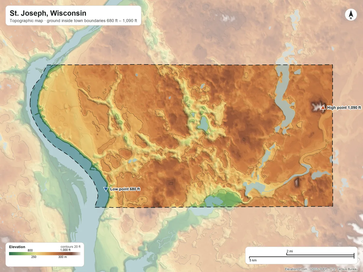 Topographic elevation map of St. Joseph, Wisconsin, shaded from 680 ft on the southwest side to 1,090 ft on Big Mound