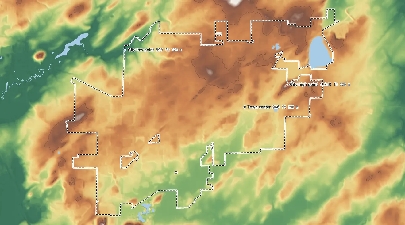 Topographic elevation map of Sun Prairie, Wisconsin, shaded from 890 ft on the northwest side to 1,040 ft on the northeast side