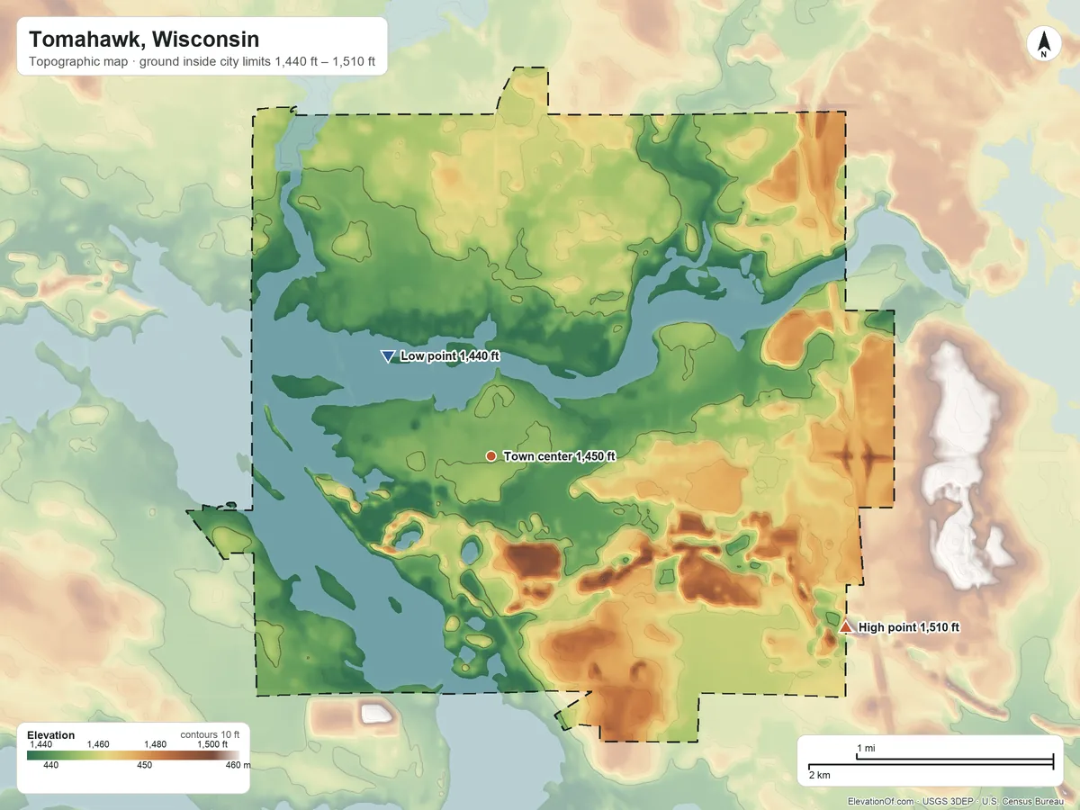 Topographic elevation map of Tomahawk, Wisconsin, shaded from 1,440 ft on the northwest side to 1,510 ft on the southeast side