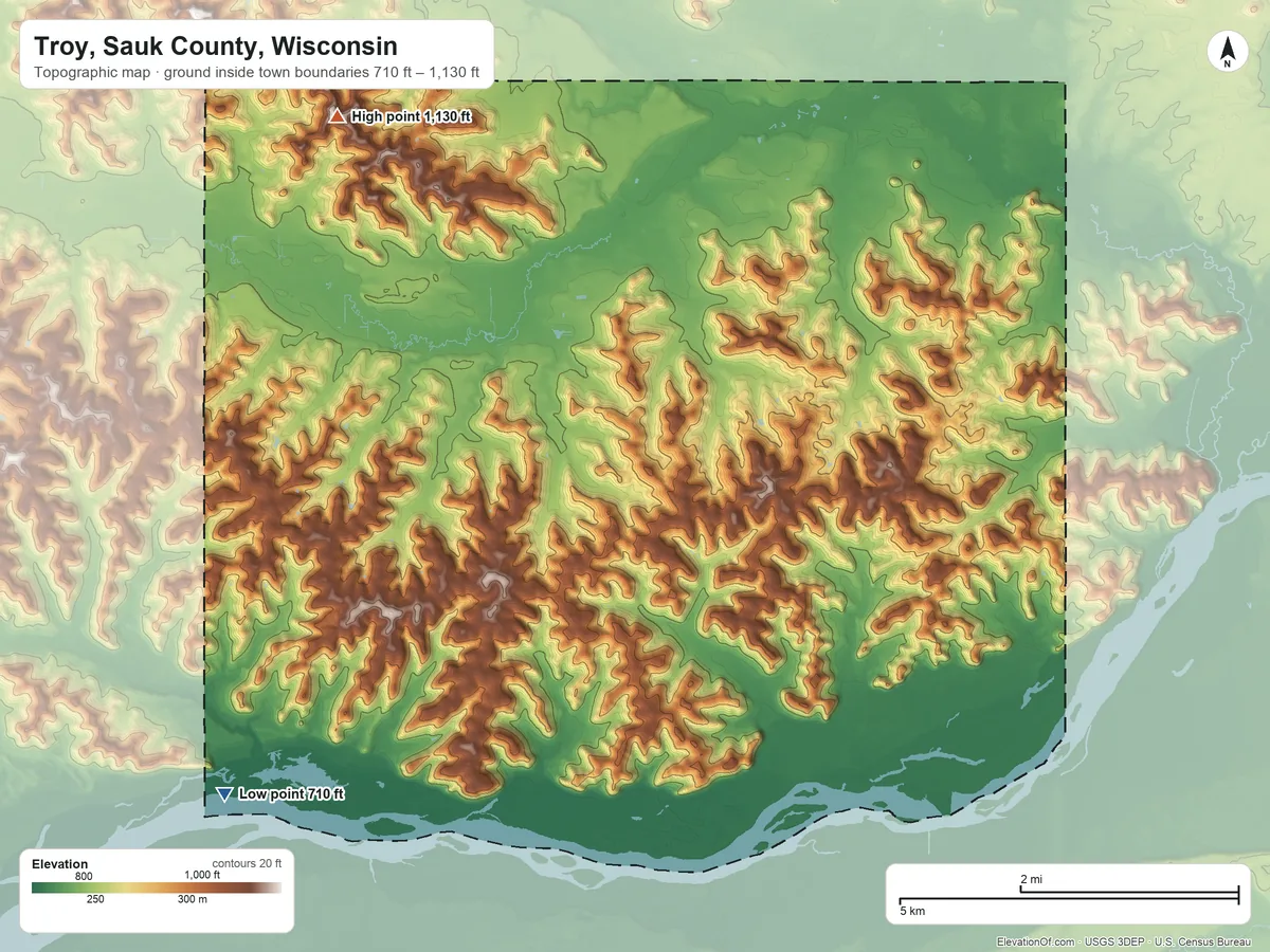 Topographic elevation map of Troy, Sauk County, Wisconsin, shaded from 710 ft on the southwest side to 1,130 ft on the northwest side