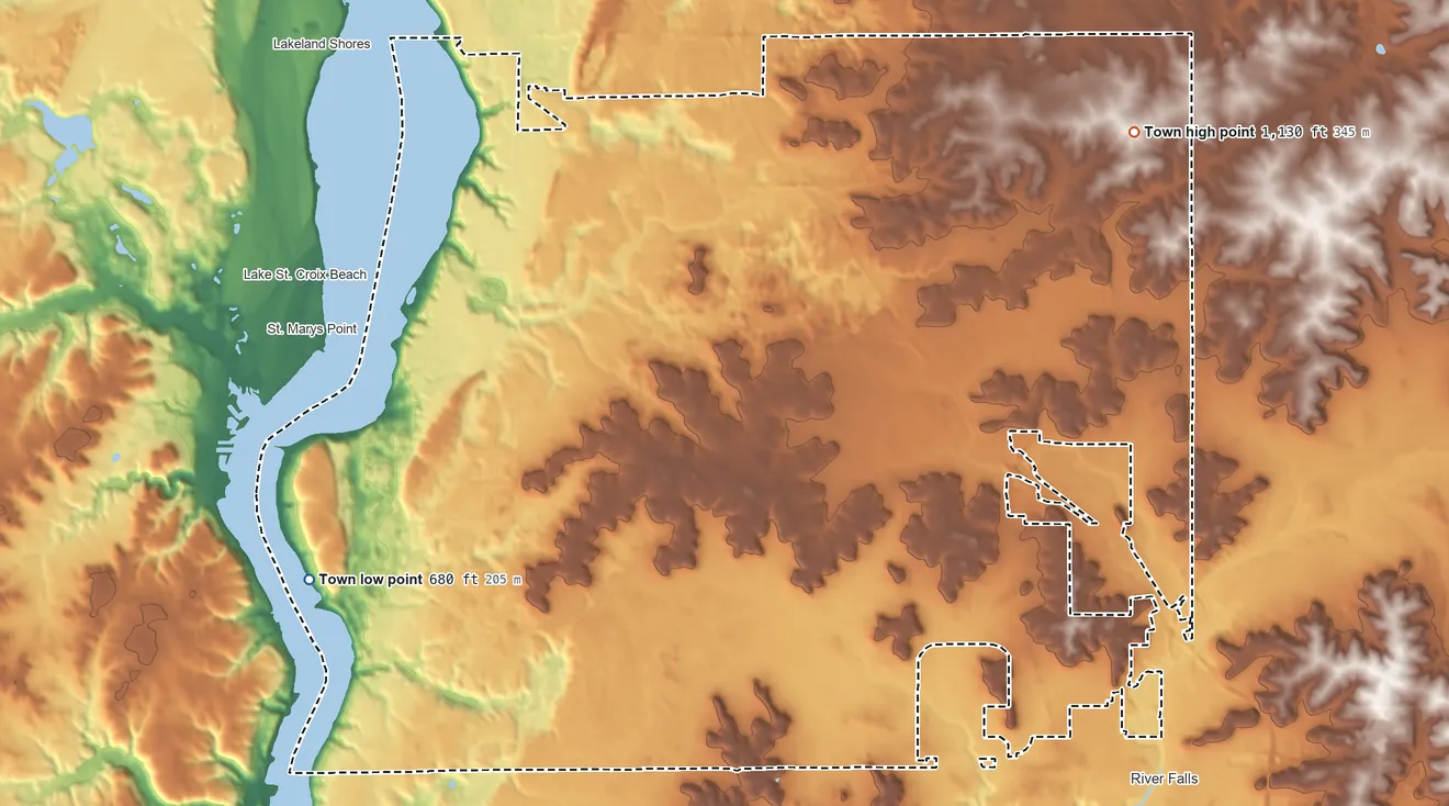 Topographic elevation map of Troy, Wisconsin, shaded from 680 ft on the southwest side to 1,130 ft on the northeast side