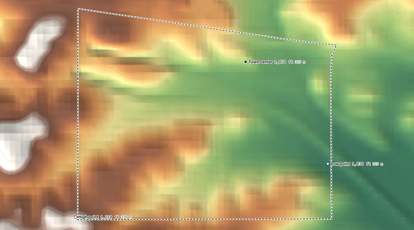 Topographic elevation map of Tunnel City, Wisconsin, shaded from 1,030 ft on the southeast side to 1,210 ft on the southwest side