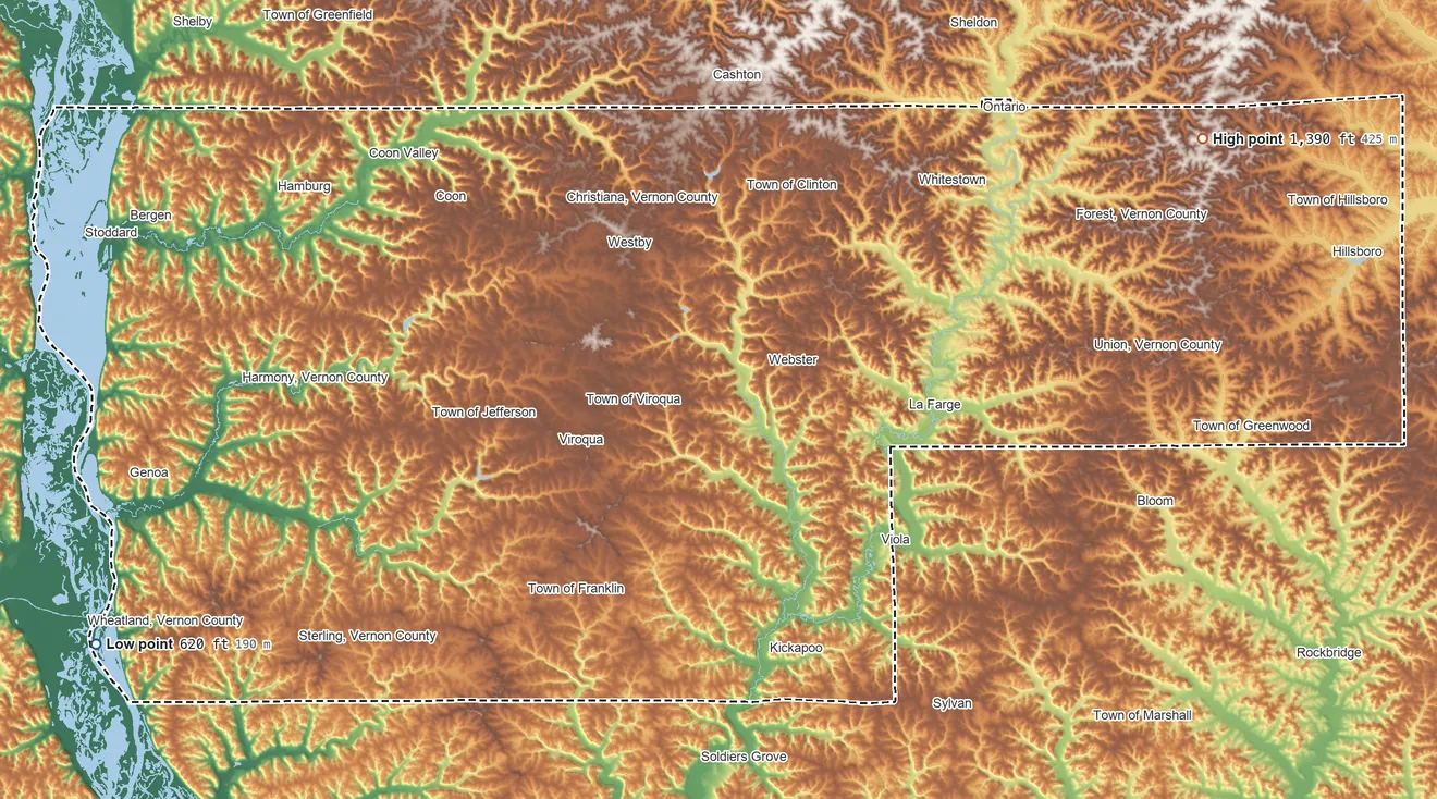 Topographic elevation map of Vernon County, Wisconsin, shaded from 620 ft on the west side to 1,390 ft on the northeast side