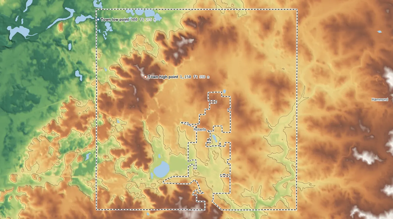 Topographic elevation map of Warren, Wisconsin, shaded from 900 ft on the northwest side to 1,150 ft on the northwest side