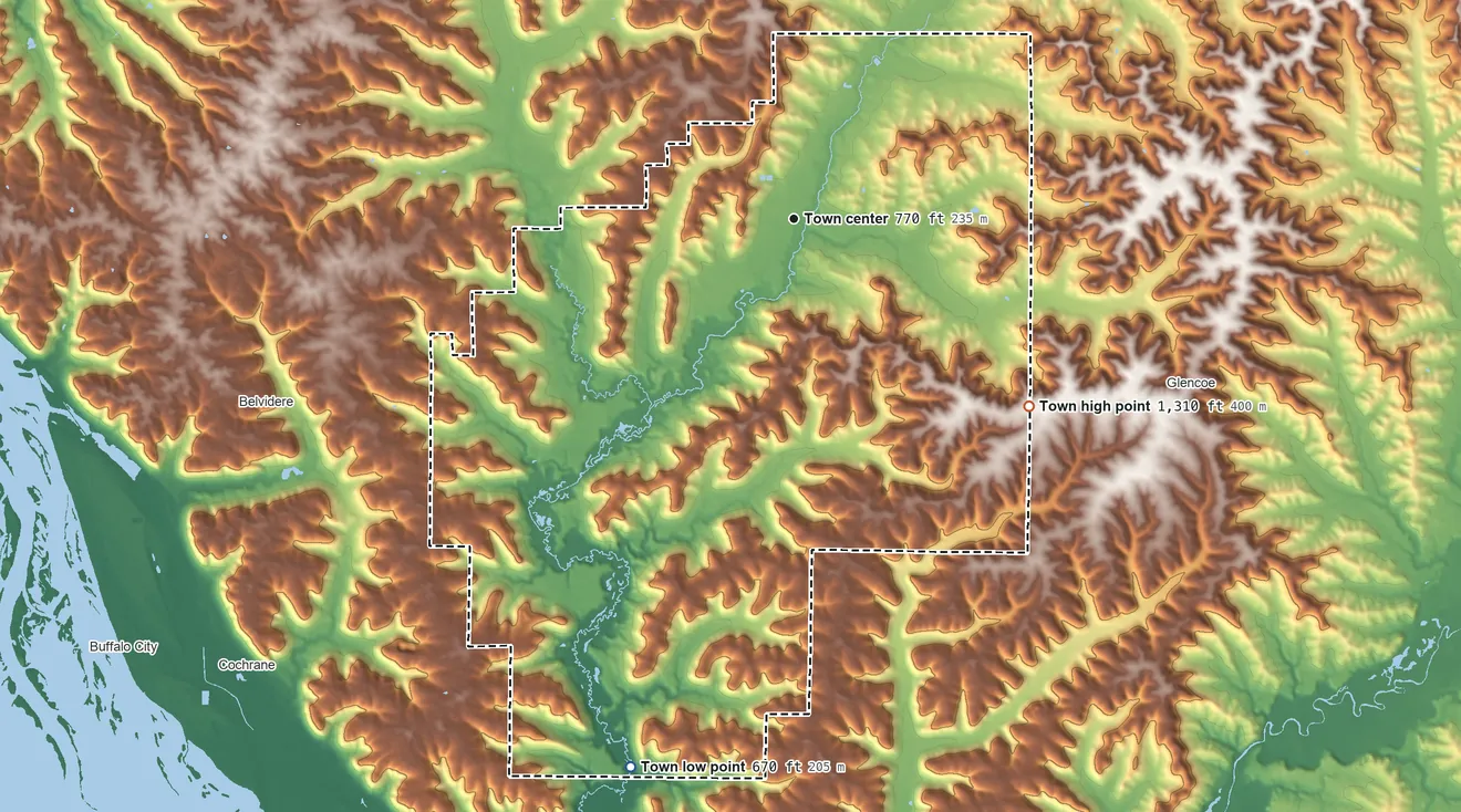 Topographic elevation map of Waumandee, Wisconsin, shaded from 670 ft on the south side to 1,310 ft on the southeast side