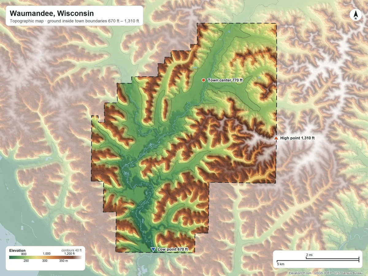 Topographic elevation map of Waumandee, Wisconsin, shaded from 670 ft on the south side to 1,310 ft on the southeast side