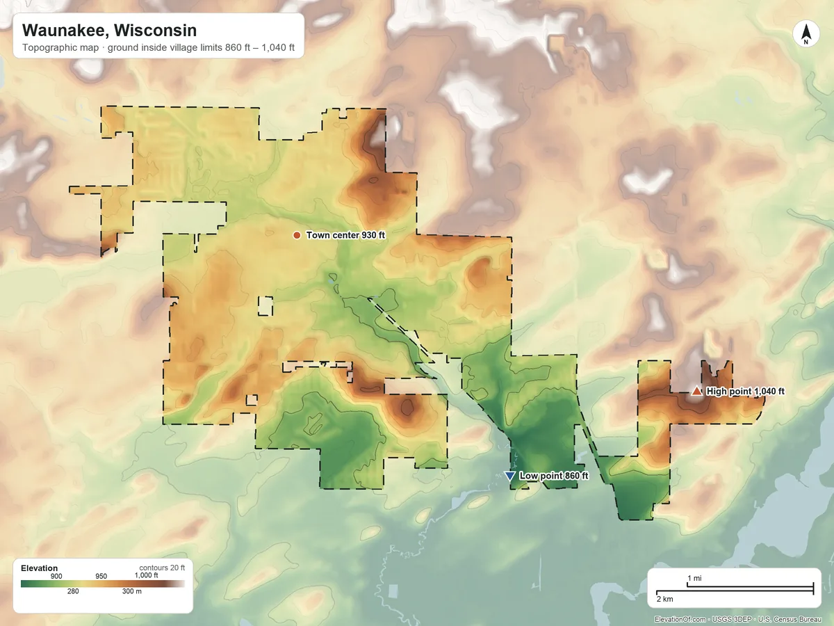 Topographic elevation map of Waunakee, Wisconsin, shaded from 860 ft on the southeast side to 1,040 ft on the east side