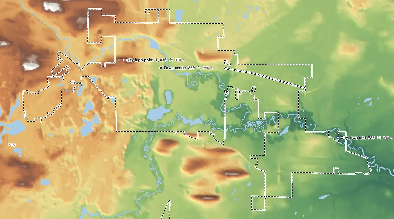 Topographic elevation map of Waupaca, Wisconsin, shaded from 780 ft on the east side to 1,010 ft near the middle