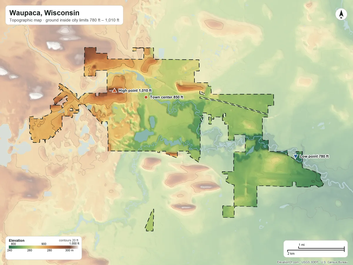 Topographic elevation map of Waupaca, Wisconsin, shaded from 780 ft on the east side to 1,010 ft near the middle