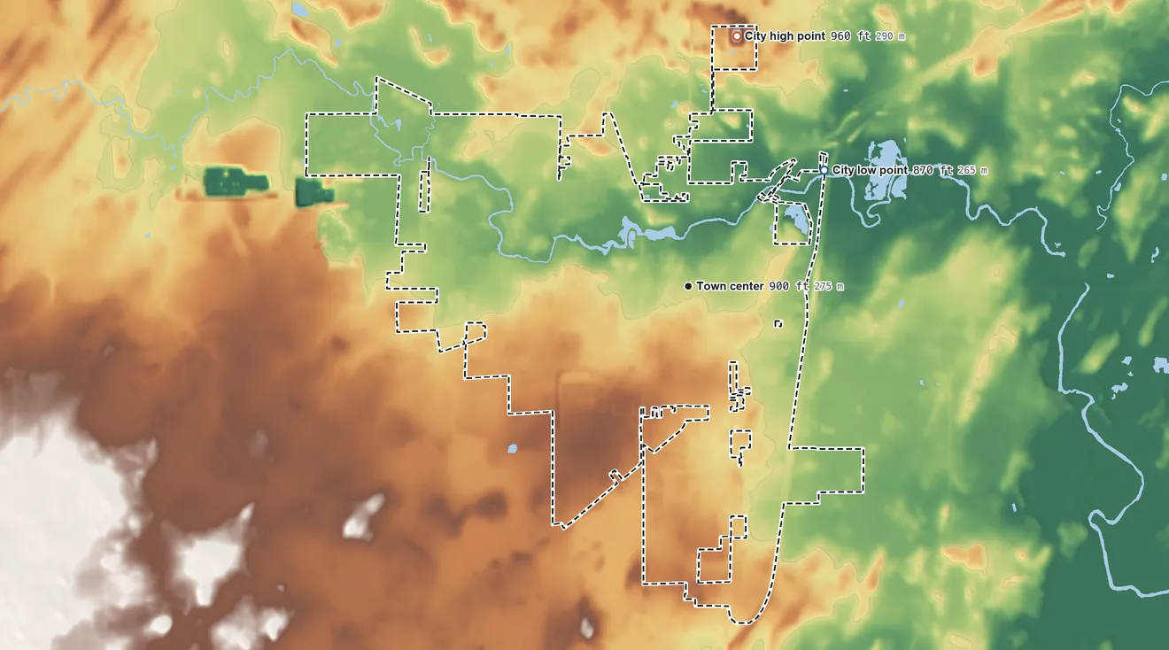 Topographic elevation map of Waupun, Wisconsin, shaded from 870 ft on the northeast side to 960 ft on the north side
