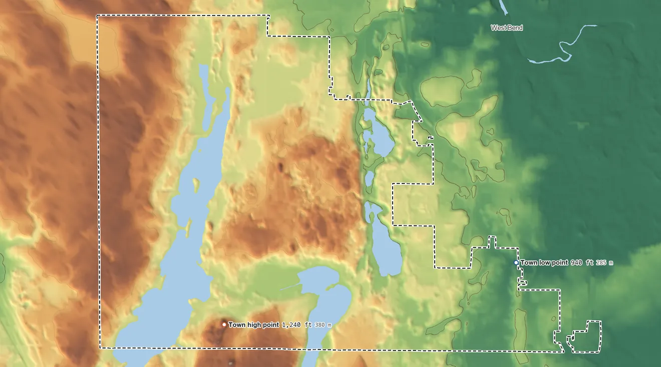 Topographic elevation map of Town of West Bend, Wisconsin, shaded from 940 ft on the east side to 1,240 ft on Fox Hill