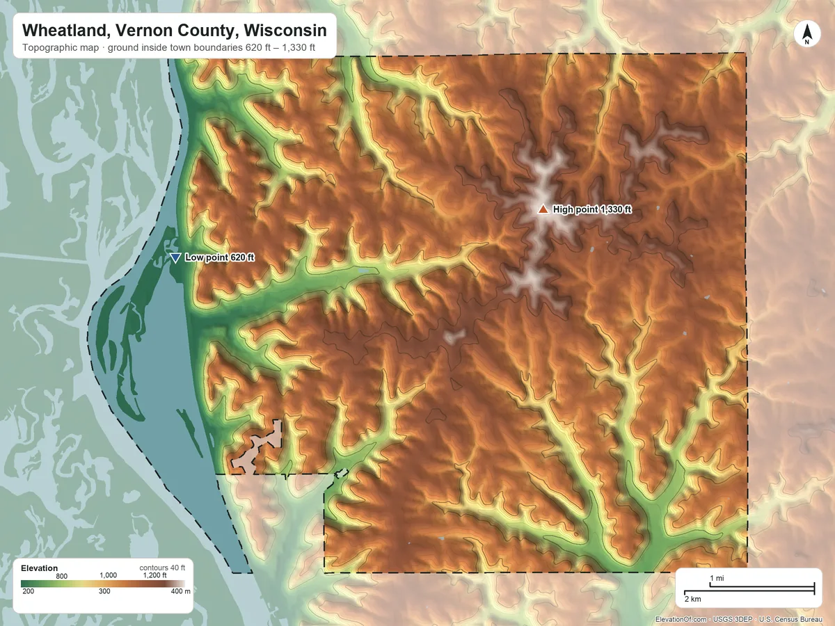 Topographic elevation map of Wheatland, Vernon County, Wisconsin, shaded from 620 ft on the west side to 1,330 ft on the east side