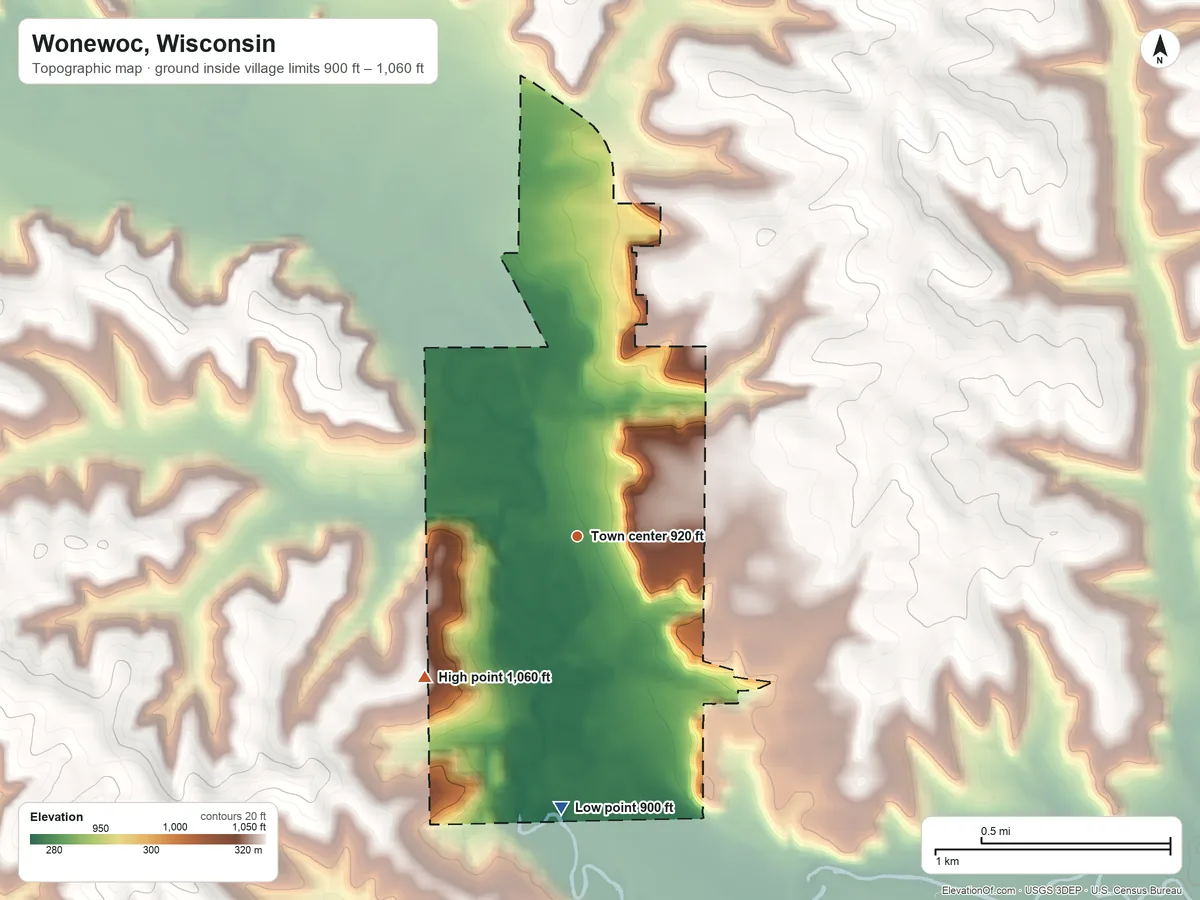 Topographic elevation map of Wonewoc, Wisconsin, shaded from 900 ft on the south side to 1,060 ft on the southwest side