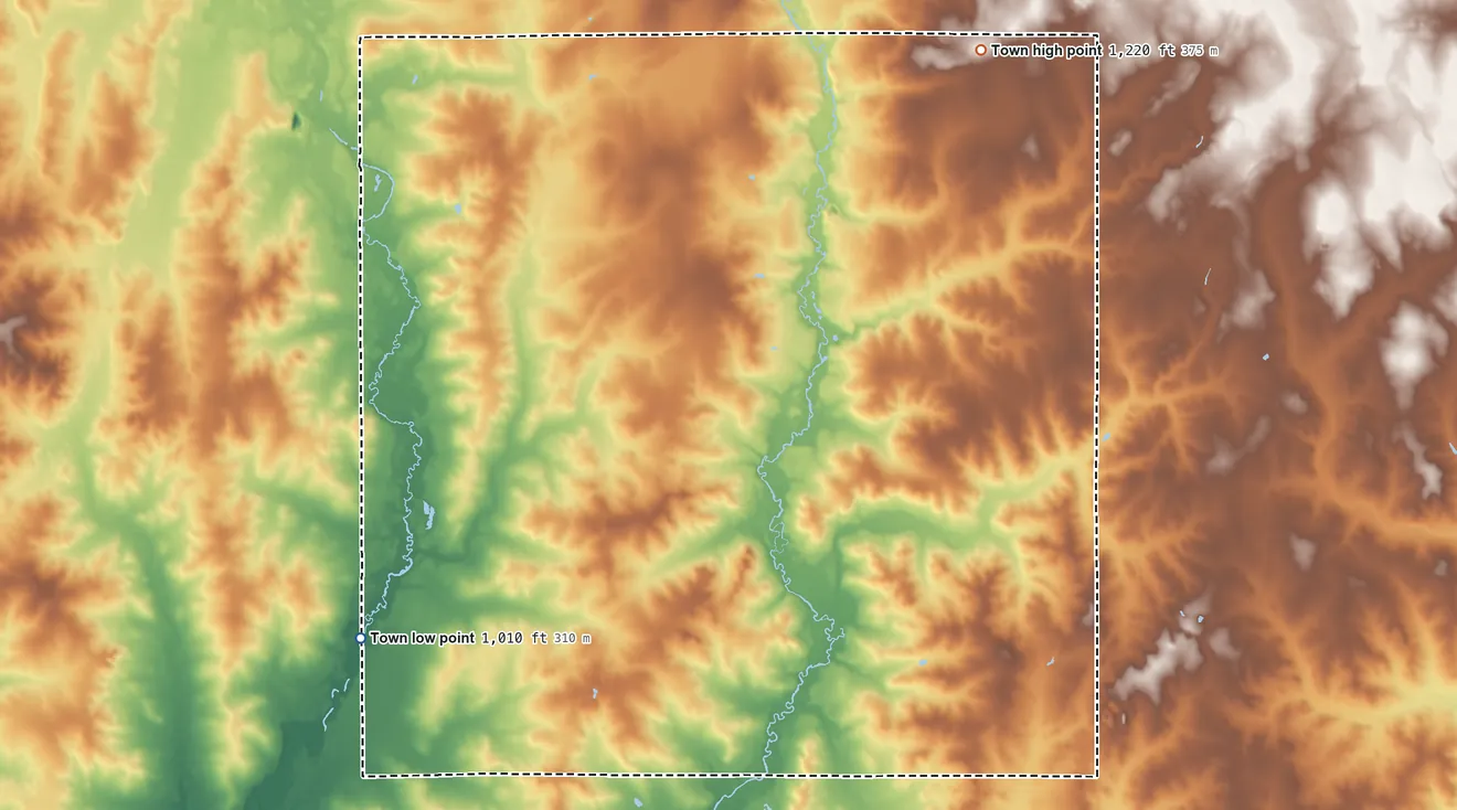 Topographic elevation map of Worden, Wisconsin, shaded from 1,010 ft on the southwest side to 1,220 ft on the northeast side
