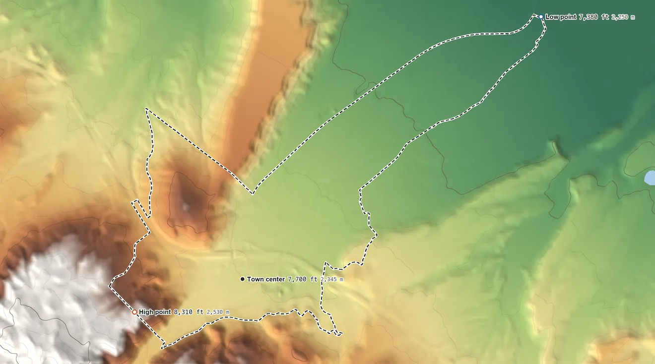Topographic elevation map of Arlington, Wyoming, shaded from 7,380 ft on the northeast side to 8,310 ft at the foot of the Snowy Range