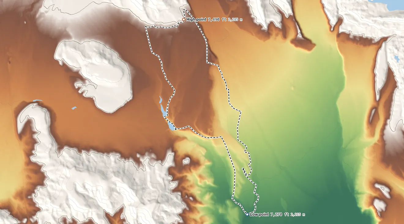 Topographic elevation map of Cora, Wyoming, shaded from 7,270 ft on the south side to 7,490 ft on the northwest edge, below higher ground just outside