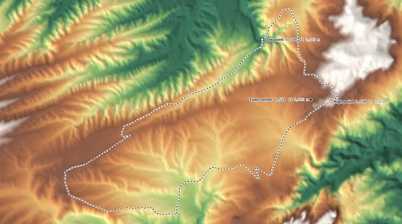 Topographic elevation map of Esterbrook, Wyoming, shaded from 6,180 ft on the northwest side to 6,590 ft near the middle
